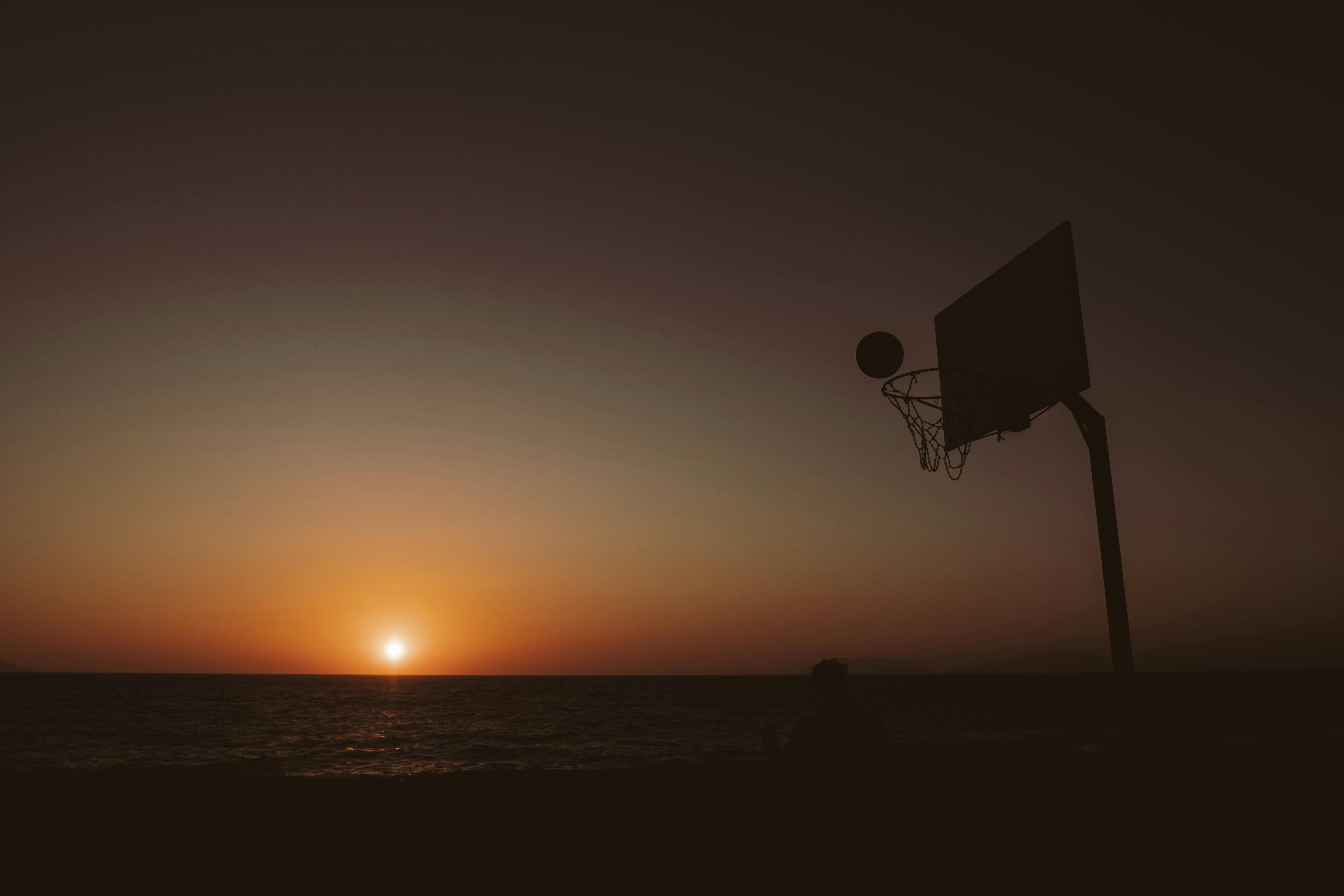 Basketball hoop at sunset